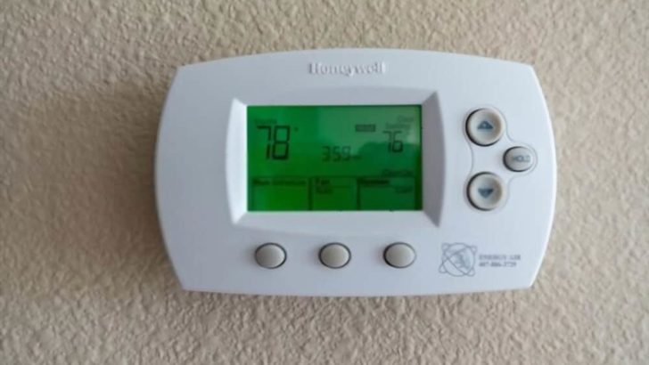 Honeywell thermostat installed at wall
