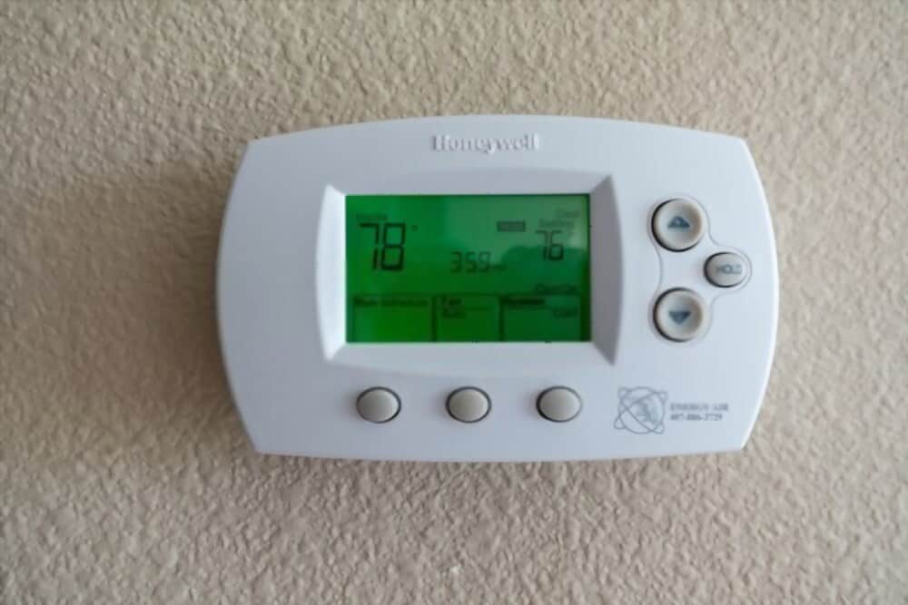 Honeywell thermostat installed at wall